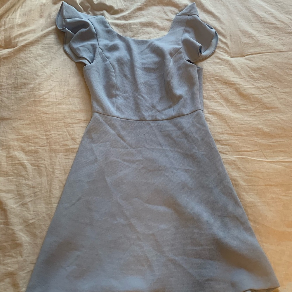 Formal blue dress with ruffled shoulders